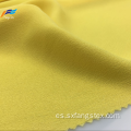Tejido amarillo teñido 100% del vestido de las señoras del hilado de poliéster